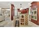 Kitchen island with seating and wine storage that complements the rest of the kitchen at 120 Hamilton Glen Ct, Fayetteville, GA 30215