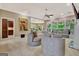 Bright and airy living room with large windows, fireplace, and comfortable seating arrangements at 120 Hamilton Glen Ct, Fayetteville, GA 30215