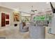 Bright and airy living room with large windows, fireplace, and comfortable seating arrangements at 120 Hamilton Glen Ct, Fayetteville, GA 30215