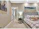 Bright main bedroom featuring a tray ceiling, neutral paint, and ensuite access at 120 Hamilton Glen Ct, Fayetteville, GA 30215