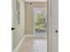 Small empty room featuring tiled flooring and a bright sunny window at 120 Hamilton Glen Ct, Fayetteville, GA 30215