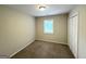 Cozy bedroom with carpet, closet and natural light is perfect for relaxation and rest at 4162 Mercer Rd, Decatur, GA 30035