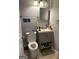 Functional bathroom with a neutral color scheme, vanity, and essential fixtures at 3479 Thompson Nw Dr, Atlanta, GA 30331