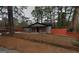 Charming single-story home with grey siding, red accents, and a well-maintained front yard at 3479 Thompson Nw Dr, Atlanta, GA 30331