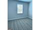 Comfortable bedroom with soft carpet and a large window for ample sunlight at 1685 Crumbley Rd # 4, Mcdonough, GA 30252