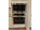 Stainless steel microwave and oven, offering modern convenience in the kitchen space at 1685 Crumbley Rd # 4, Mcdonough, GA 30252