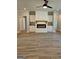 Cozy living room with a modern fireplace flanked by built-in cabinets and shelving at 1685 Crumbley Rd # 4, Mcdonough, GA 30252