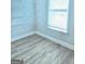 Walk-in pantry features bright walls, wood floors, wire shelving, and a bright window at 1685 Crumbley Rd # 4, Mcdonough, GA 30252