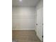 Walk-in closet featuring carpeted floors and wire shelving system at 1685 Crumbley Rd # 4, Mcdonough, GA 30252