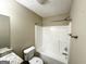Full bathroom with a shower-tub combo, and granite countertop vanity at 9151 Jefferson Village Sw Dr, Covington, GA 30014