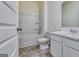 Clean, bright bathroom with a shower-tub combo, toilet, and vanity sink at 616 Whitman Ln # 30, Stockbridge, GA 30281