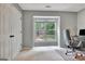Bright bedroom featuring neutral colors, large window and closet space at 104 Whisper Trce, Peachtree City, GA 30269