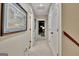 Inviting hallway with neutral tones and access to the rest of the home at 104 Whisper Trce, Peachtree City, GA 30269