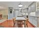 Spacious kitchen with an eat in island, stainless steel appliances, and updated cabinetry at 104 Whisper Trce, Peachtree City, GA 30269