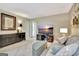 Relaxing living room with neutral tones, comfortable seating, and a television for entertainment at 104 Whisper Trce, Peachtree City, GA 30269
