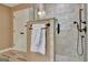 Large tiled shower with rainfall shower head and hand shower with sleek towel rack at 104 Whisper Trce, Peachtree City, GA 30269