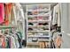 Spacious walk-in closet with custom shelving and ample hanging space at 104 Whisper Trce, Peachtree City, GA 30269