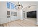 Elegant dining room with large windows, a modern chandelier, and ample natural light at 1007 Fairway Seven, Villa Rica, GA 30180