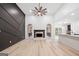 Spacious living room showcases a modern fireplace, high ceilings, and abundant light at 1007 Fairway Seven, Villa Rica, GA 30180