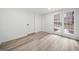Room with french doors and luxury vinyl plank flooring perfect for an office or workout space at 1007 Fairway Seven, Villa Rica, GA 30180