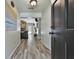 Inviting foyer with wood-look flooring and view into the living area at 125 Wendell Ct, Fayetteville, GA 30215