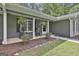 Inviting front porch with rocking chairs and decorative plants at 125 Wendell Ct, Fayetteville, GA 30215