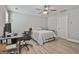 Cozy bedroom featuring a ceiling fan and ample natural light at 430 Silverbell Ct, Peachtree City, GA 30269