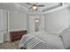 Bedroom featuring trey ceiling, soft light, and convenient access to an ensuite bathroom at 430 Silverbell Ct, Peachtree City, GA 30269