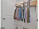 Walk-in closet with ample hanging space and shelving for storage at 430 Silverbell Ct, Peachtree City, GA 30269