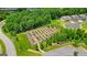 Aerial view of a community garden with raised beds, offering residents a space for gardening at 430 Silverbell Ct, Peachtree City, GA 30269