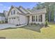 Charming one-story home featuring a well-kept lawn and manicured landscaping at 430 Silverbell Ct, Peachtree City, GA 30269