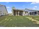 View of the house exterior from the backyard at 430 Silverbell Ct, Peachtree City, GA 30269