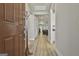 Inviting entryway with light wood floors leading into the home at 430 Silverbell Ct, Peachtree City, GA 30269