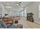 Bright living room features neutral walls and wood floors at 430 Silverbell Ct, Peachtree City, GA 30269