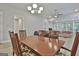 Open living room with wood floors and lots of natural light at 430 Silverbell Ct, Peachtree City, GA 30269
