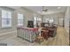 Open living room area features lots of natural light, wood floors, and neutral walls at 430 Silverbell Ct, Peachtree City, GA 30269