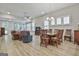 Spacious living room with wood floors, neutral walls, and lots of natural light at 430 Silverbell Ct, Peachtree City, GA 30269