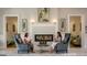 A comfortable resident lounge features a cozy fireplace and stylish seating for relaxation and socializing at 430 Silverbell Ct, Peachtree City, GA 30269