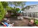 Charming backyard features outdoor furniture and a view of the home's indoor pool at 239 Kings Hwy, Decatur, GA 30030
