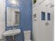 Modern bathroom featuring blue accent tiling and bright white fixtures at 239 Kings Hwy, Decatur, GA 30030