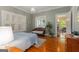 Bedroom featuring hardwood floors, a window bench, and neutral wall color at 239 Kings Hwy, Decatur, GA 30030