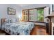 Bright bedroom with plantation shutters and hardwood floors at 239 Kings Hwy, Decatur, GA 30030