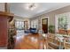 Bright dining room with hardwood floors and a view to sunroom at 239 Kings Hwy, Decatur, GA 30030