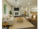 Well-lit living room showcasing modern furniture and a cozy fireplace at 2851 Headland Dr, East Point, GA 30344