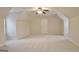 Finished attic with neutral walls, plush carpet, a ceiling fan, and lots of space at 112 Windalier Rdg, Peachtree City, GA 30269
