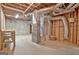 Spacious unfinished basement area with exposed ductwork, concrete walls, and a concrete floor at 112 Windalier Rdg, Peachtree City, GA 30269