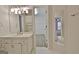 Bathroom with a vanity, and views into the closet space and adjacent living area at 112 Windalier Rdg, Peachtree City, GA 30269