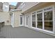 Spacious deck with white trim, multiple windows and a door leading into the home's interior at 112 Windalier Rdg, Peachtree City, GA 30269