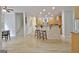 Spacious kitchen with breakfast bar and hardwood flooring at 112 Windalier Rdg, Peachtree City, GA 30269