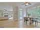 Open floor plan featuring a kitchen and dining area that flows seamlessly into the living room at 112 Windalier Rdg, Peachtree City, GA 30269
